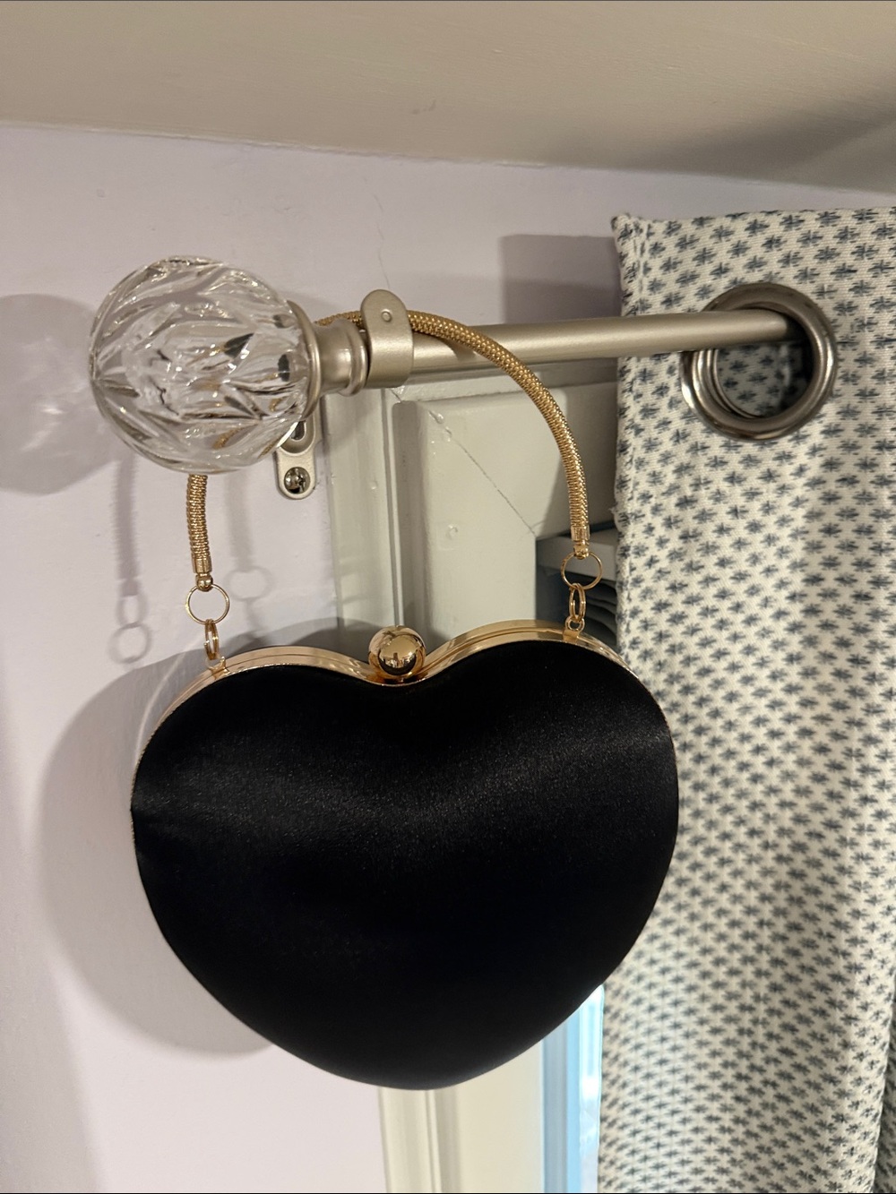 Black Heart-Shaped Evening Bag with Gold Accents